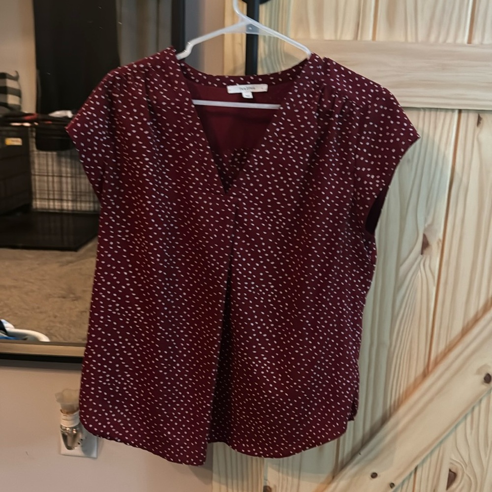 Boutique style polkadot blouse with V-neck detail